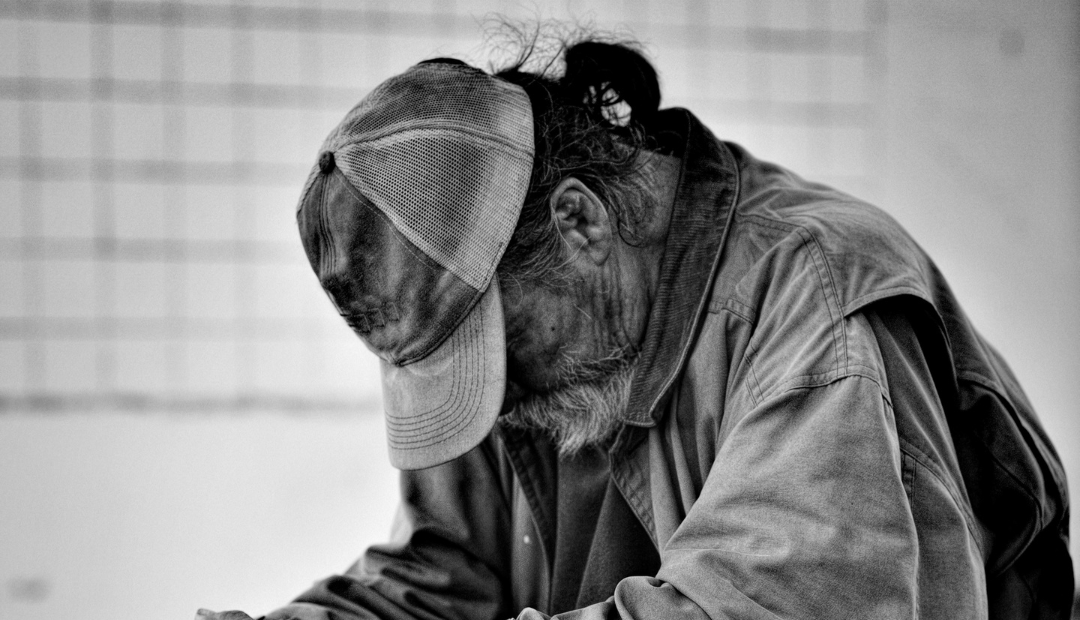 Homelessness need help call to action. Need help call to action. With a homeless man.